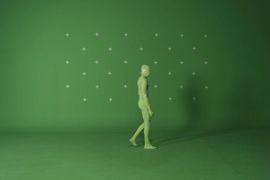 a person wearing a chroma key suit